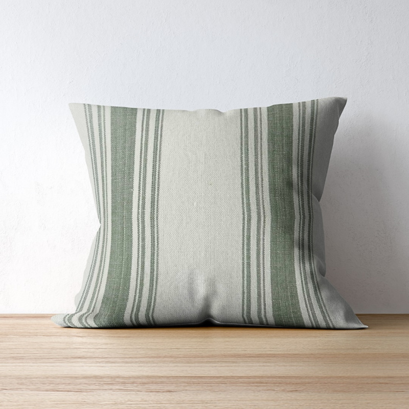 Ona Olive Green on a throw pillow