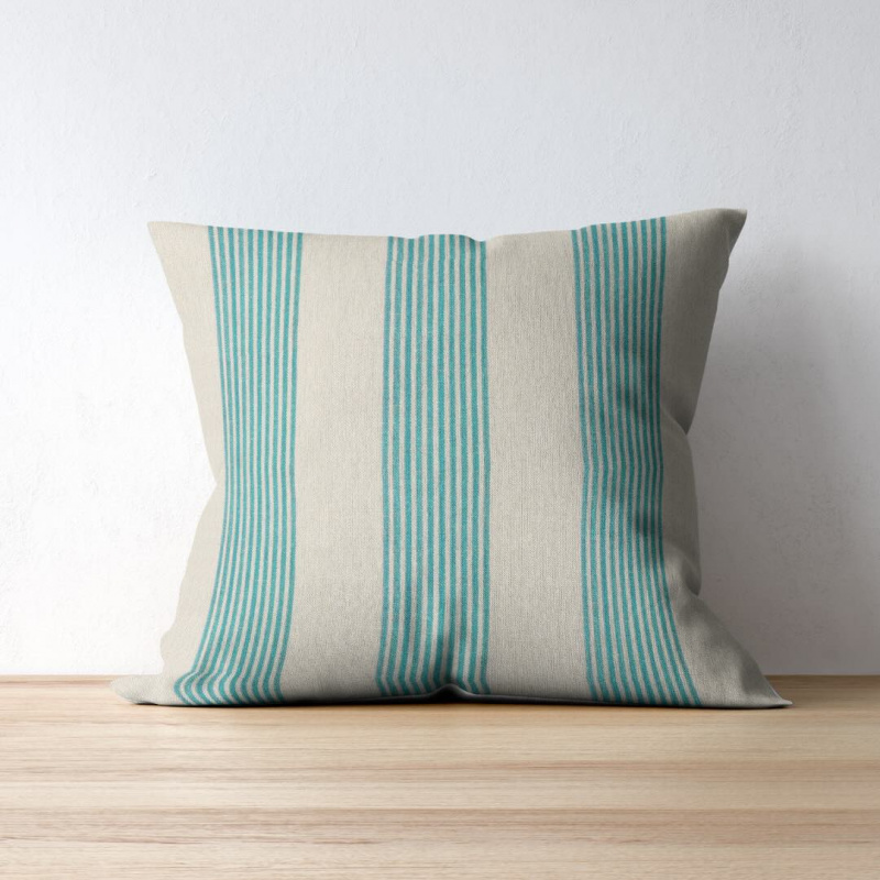 Correfoc Turquoise on a throw pillow