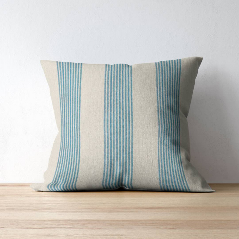 Correfoc Sky Blue on a throw pillow