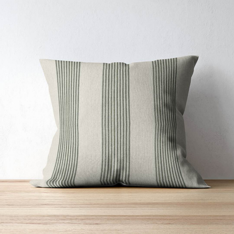 Correfoc Olive Green on a throw pillow