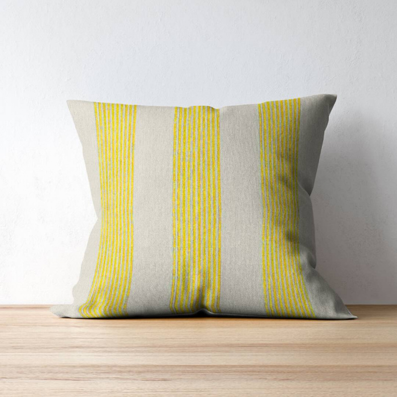 Correfoc Yellow on a throw pillow
